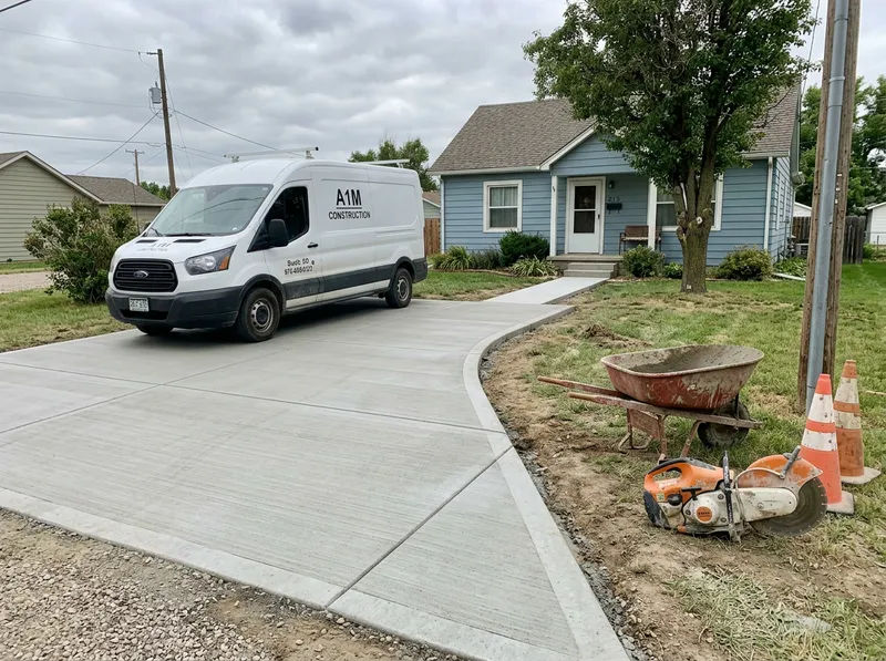A1M Construction work van at a Fort Morgan job site
